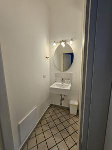 a bathroom with a sink and a mirror at B&B mirò e appartamenti in Marina di Gioiosa Ionica +24 photos