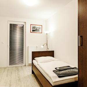 Ένα ή περισσότερα κρεβάτια σε δωμάτιο στο eFi Palace Hotel