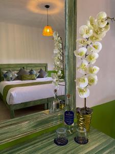 Postel nebo postele na pokoji v ubytování Hotel Pedregal