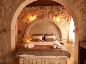 A bed or beds in a room at hotels crazy horse