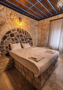 A bed or beds in a room at hotels crazy horse