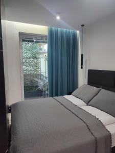 Posteľ alebo postele v izbe v ubytovaní Apartament Przystań z tarasem
