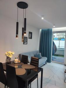 Posedenie v ubytovaní Apartament Przystań z tarasem