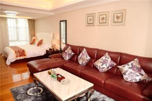 Zona de estar de Guangzhou Boman Apartment Zhengjia Huanshi Branch