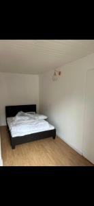 ヴィジーユにあるAppartement plein centreのベッドルーム1室(ベッド1台付)