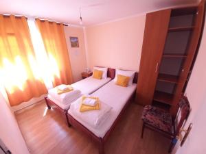 Letto o letti in una camera di Apartmani Sobe Sljivancanin