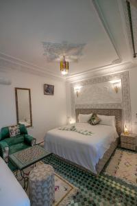 En eller flere senge i et værelse på Riad Nari Fez