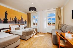 Posteľ alebo postele v izbe v ubytovaní Hotel Merkur - Czech Leading Hotels