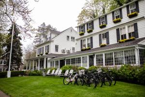 a group of bikes parked in front of a house at The Maidstone Inn in East Hampton