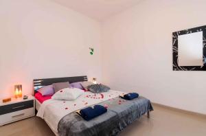 Posteľ alebo postele v izbe v ubytovaní Apartment Seline - Paklenica Riviera 35389