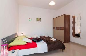 Posteľ alebo postele v izbe v ubytovaní Apartment Seline - Paklenica Riviera 35389
