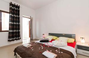 Posteľ alebo postele v izbe v ubytovaní Apartment Seline - Paklenica Riviera 35389