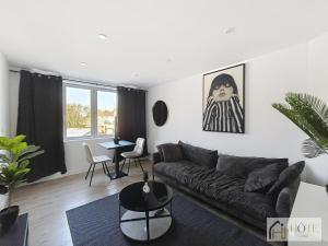 Ruang duduk di Le Central - Appartement au 1er étage +1 gambar