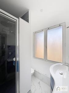 Bilik mandi di Le Central - Appartement au 1er étage
