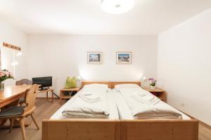 Letto o letti in una camera di Chesa Michel