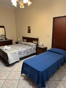 Una cama o camas en una habitación de La casa di Egizia