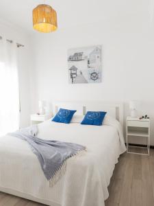 Katil atau katil-katil dalam bilik di Encanto das Dunas Aveiro +27 gambar
