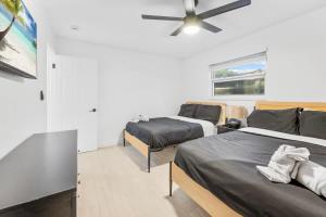 Postel nebo postele na pokoji v ubytování Modern Luxe Hideaway