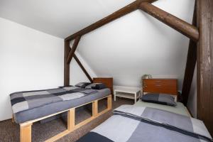 Postel nebo postele na pokoji v ubytování MERTLIN Resort