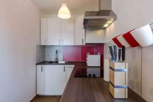 Kuchyň nebo kuchyňský kout v ubytování Apartment in Novi Vinodolski 39131