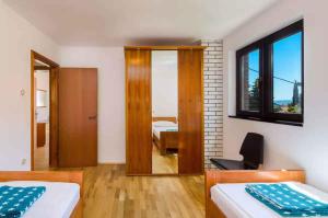 Postel nebo postele na pokoji v ubytování Apartment in Novi Vinodolski 39131