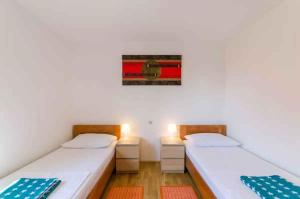 Postel nebo postele na pokoji v ubytování Apartment in Novi Vinodolski 39131