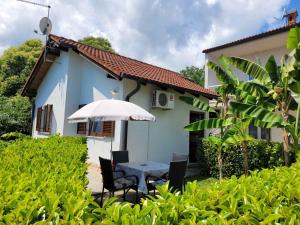 Vonkajšia záhrada v ubytovaní Holiday home in Lovran 15113