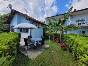 Vonkajšia záhrada v ubytovaní Holiday home in Lovran 15113