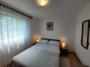 Posteľ alebo postele v izbe v ubytovaní Holiday home in Lovran 15113