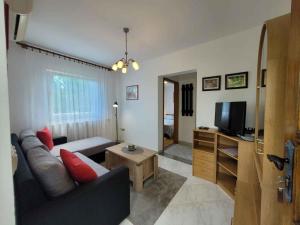 Televízia a/alebo spoločenská miestnosť v ubytovaní Holiday home in Lovran 15113