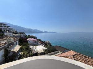 a view of the ocean from a building at Q Bay Apartments in Qeparo
