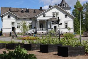 Zahrada ubytování Olkkolan Hovi resort + 8 fotografií