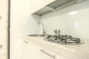 a bathroom with a sink and a counter at Walsimar2 - Passi dalla spiaggia in Grado
