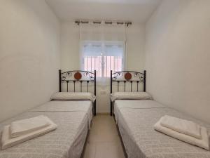 Postel nebo postele na pokoji v ubytování Apartamento en primera linea + 7 fotografií