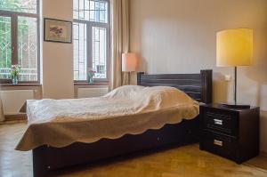Katil atau katil-katil dalam bilik di TiflisLux Apartment - Chaikovski