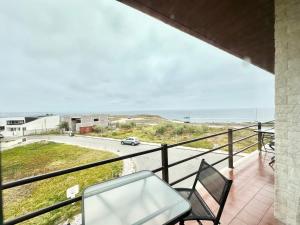 a balcony with a view of the ocean at Deluxe Oceanfront - Vue Sur la Mer in Peniche