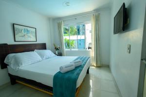 Postel nebo postele na pokoji v ubytování Hotel Villeta Suite SPA + 37 fotografií