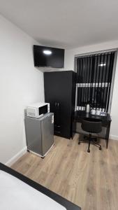 Kuchyň nebo kuchyňský kout v ubytování Comfort apartments