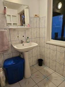 a bathroom with a sink and a mirror at Ofidaki Glamping in Vama Veche