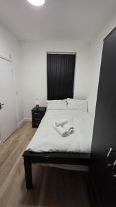 Postel nebo postele na pokoji v ubytování Comfort apartments
