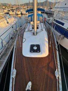 a boat docked in a marina with other boats at Voilier Dufour Classic 35 in Hendaye