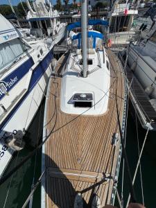a boat is docked at a dock in the water at Voilier Dufour Classic 35 in Hendaye