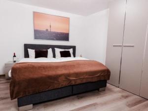 Ένα ή περισσότερα κρεβάτια σε δωμάτιο στο Exklusives Chalet am Lift