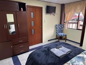 Postel nebo postele na pokoji v ubytování Hotel Casa Santa Lucía