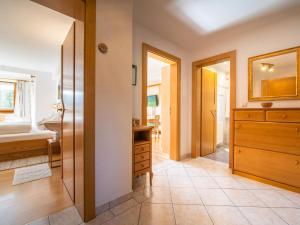 A bed or beds in a room at Schleicherhof V