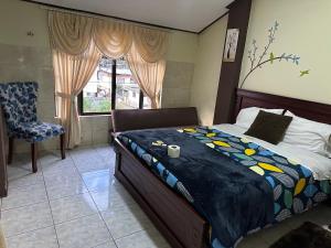 Postel nebo postele na pokoji v ubytování Hotel Casa Santa Lucía