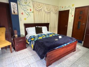 Postel nebo postele na pokoji v ubytování Hotel Casa Santa Lucía
