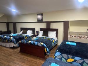 Postel nebo postele na pokoji v ubytování Hotel Casa Santa Lucía