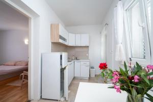Fotografie z fotogalerie ubytování Apartments by the sea Stara Novalja, Pag - 4099 v Novalji