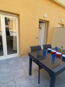 Φωτογραφία από το άλμπουμ του T3 rdc, terrasse ombragée, parking avec portail σε Saint-Laurent-de-la-Salanque